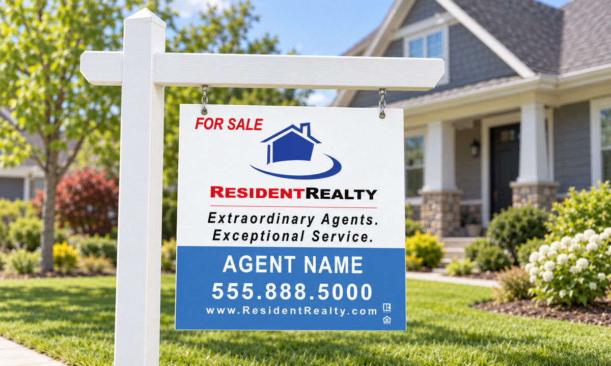 Resident Realty listing sign system installed in a front yard